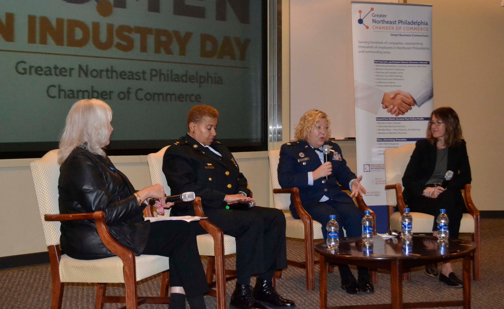 DLA Troop Support Project Manager Air Force Reserve Lt. Col. Susan McMullen, center right, shares her personal story of being a woman in the military alongside fellow panelists Greater Northeast Philadelphia Chamber of Commerce President Pam Henshall, left, City of Philadelphia Police Department Deputy Commissioner Robin Wimberly, center left, and FBI Special Agent Cerena Coughlin, right,  during the Chamber’s annual Women in Industry Day event Nov. 20, 2019 at Holy Family University in Philadelphia. The Women in Industry Day event aims to “broaden the conversation” and expose women to various career opportunities. McMullen served as a panelist during the “women in male-dominated industries” discussion. (Photo by Alexandria Brimage-Gray)