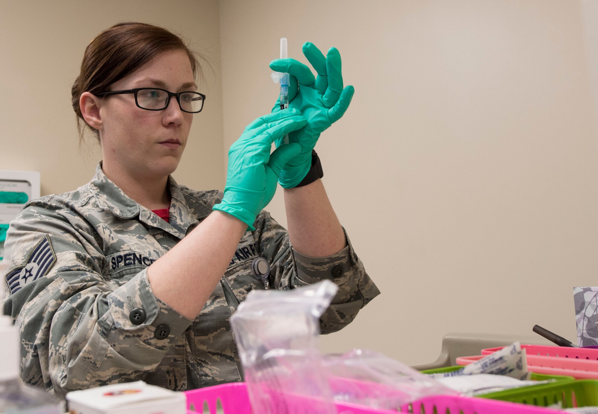 U.S. Air Force Tech. Sgt. Jake Spencer, 20th Healthcare Operations Squadron noncommissioned officer in charge of immunizations, prepares to administer a flu shot at Shaw Air Force Base, South Carolina, Nov. 11, 2019.