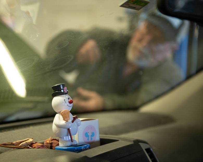 Billie Woods, 22nd Force Support Squadron Auto Shop mechanic, inspects a vehicle Nov. 19, 2019, at McConnell Air Force Base, Kan. Woods inspected batteries, brakes, fluids, visors and lights then provided feedback and recommendations to less mechanically inclined drivers to give them confidence for the winter. (U.S. Air Force photo by Staff Sgt. Chris Thornbury)