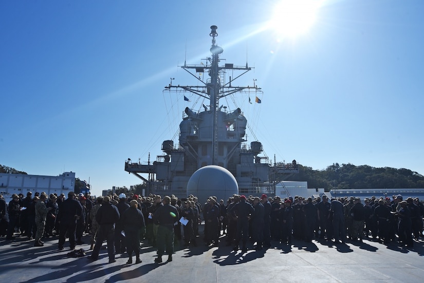 Sailors practice abandon-ship drill.