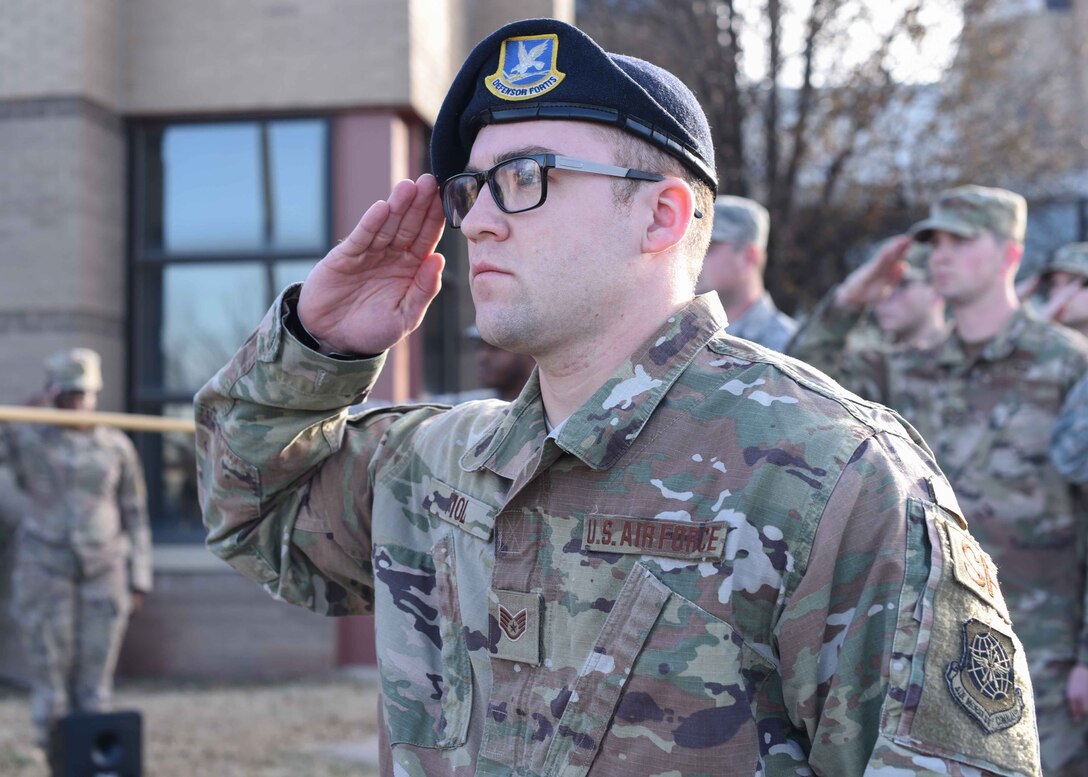 Staff Sgt. Ryan Fiol, 22nd Security Forces Squadron patrolman, leads the Airman Leadership School retreat ceremony Nov. 19, 2019, at McConnell Air Force Base, Kan. ALS is a crucial portion in the first steps of preparing the Air Force’s next generation of front-line supervisors by giving them the tools to become successful leaders and helping them accept their new responsibilities. (U.S. Air Force photo by Airman 1st Class Alexi Bosarge)