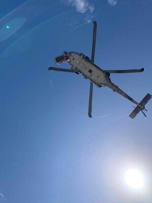 PACIFIC OCEAN (Nov. 20, 2019) A Chinese national in medical distress rescued aboard the Chinese-flagged vessel Jin Bo is secured in the rescue basket and hoisted to an MH-60S Sea Hawk helicopter during a medical evacuation mission conducted by the "Island Knights" of Helicopter Sea Combat Squadron (HSC) 25.  The patient received life-saving medical care by the HSC-25 flight surgeon and medical team while being transported approximately 100 miles to Guam Memorial Hospital for treatment. HSC-25 provides a multi-mission rotary wing capability for units in the U.S. 7th Fleet area of operations and maintains a Guam-based 24-hour search-and-rescue and medical evacuation capability, directly supporting U.S. Coast Guard and Joint Region Marianas. HSC-25 is the Navy’s only forward-deployed MH-60S expeditionary squadron.