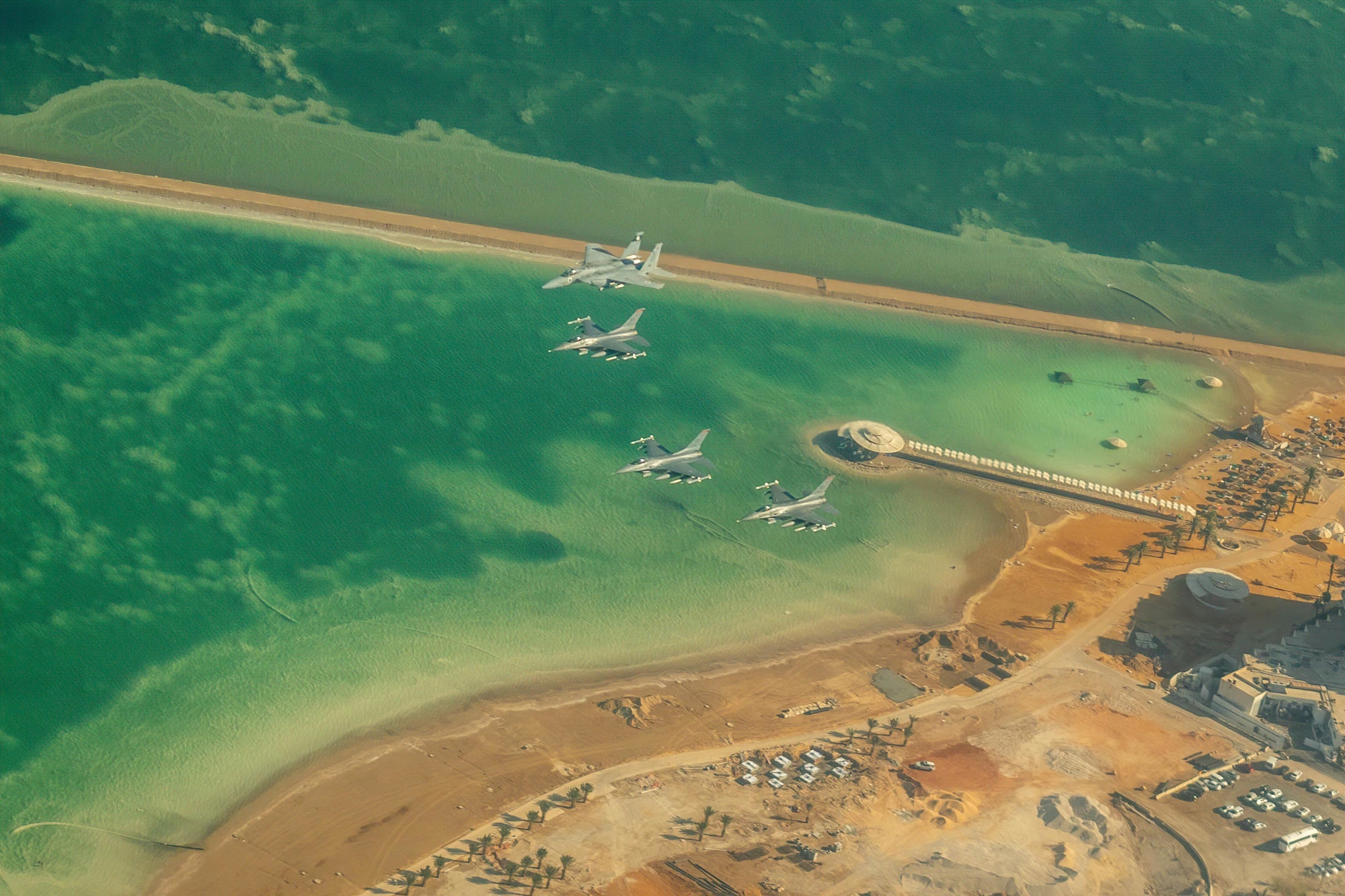Three U.S. Air Force F-16 Fighting Falcons, assigned to the 480th Expeditionary Fighter Squadron, fly with an Israeli air force F-15I Ra'am over the Dead Sea, during exercise Blue Flag 2019 at Uvda Air Base, Israel, November 5, 2019. Blue Flag 2019 provided Airmen with the opportunity to improve cooperation with their Israeli allies. (Courtesy photo by Israeli air force public affairs)