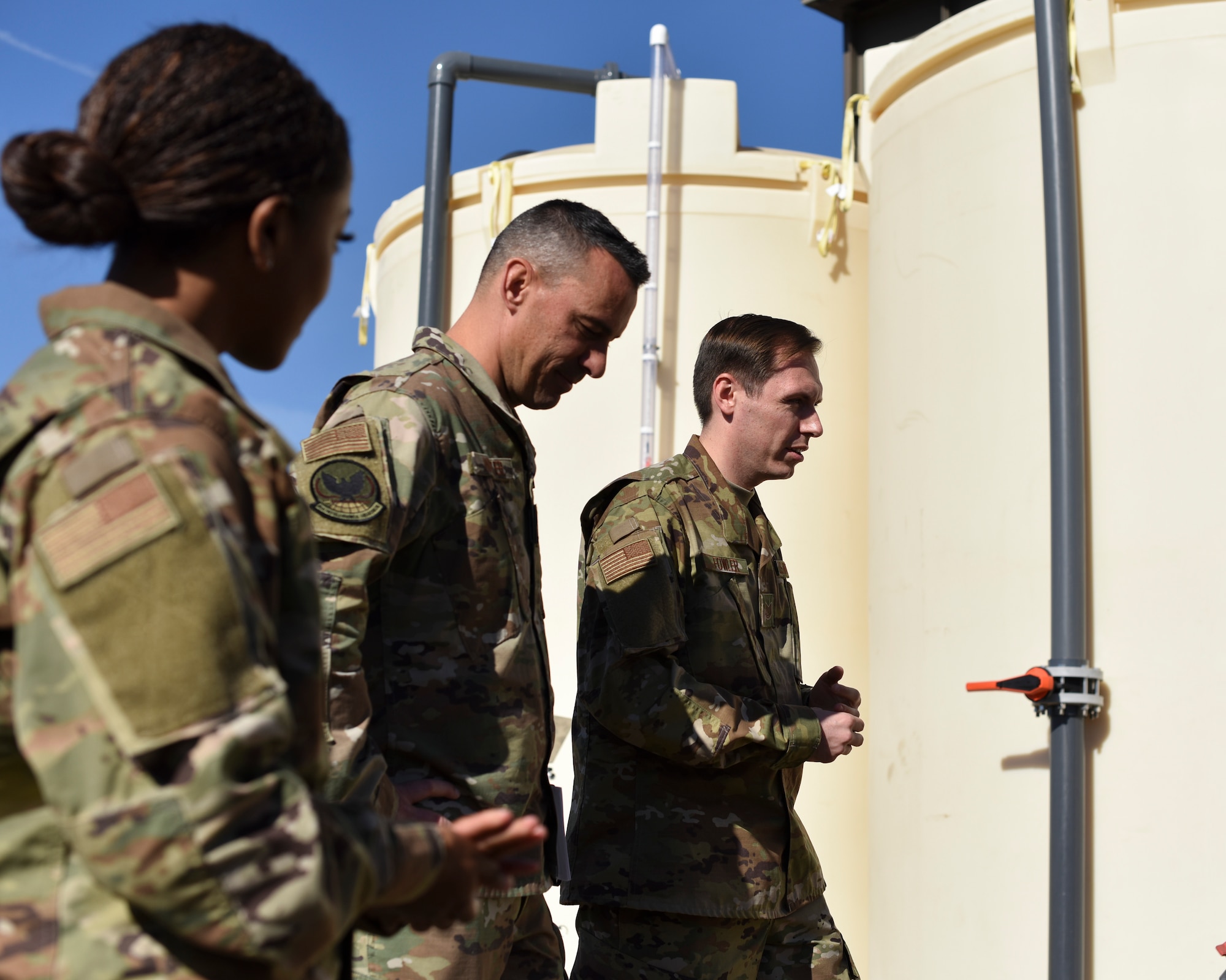 A photo of Chief Master Sgt. Trey Walker touring the U-2 Dragon Lady’s Optical Bar Camera Film Processing Center at Beale Air Force Base