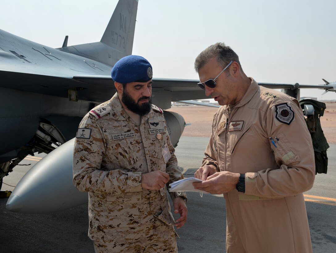U.S. Air Force Lt. General Joesph Guastella, right, U.S. Air Forces Central Command commander, converses with Saudi Arabian Major General Khaled Al-Shablan, left, at Prince Sultan Air Base, Kingdom of Saudi Arabia, Nov. 11, 2019.