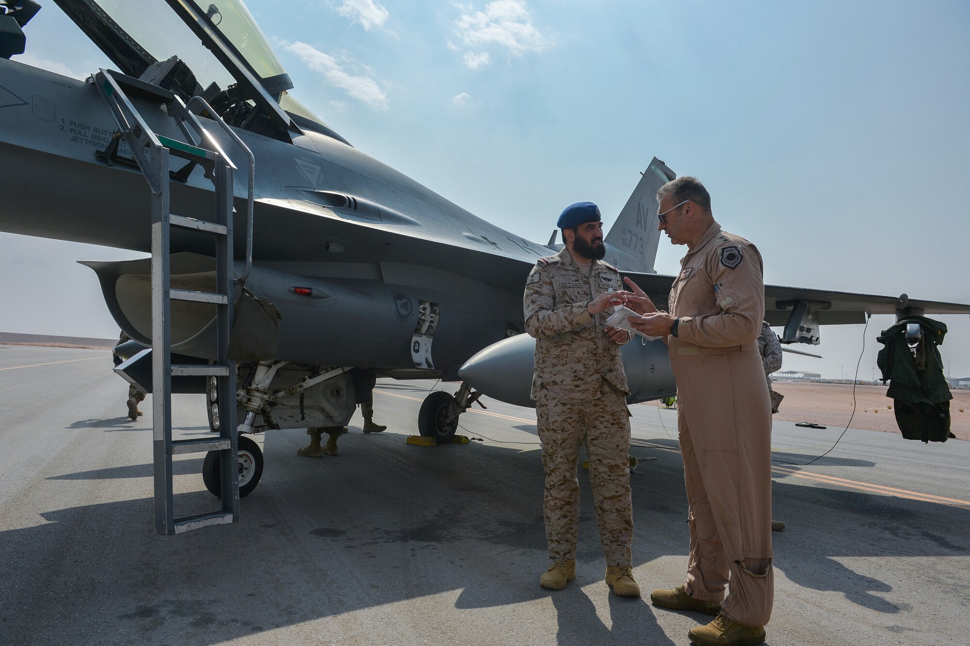 U.S. Air Force Lt. General Joesph Guastella, right, U.S. Air Forces Central Command commander, converses with Saudi Arabian Major General Khaled Al-Shablan, left, at Prince Sultan Air Base, Kingdom of Saudi Arabia, Nov. 11, 2019.