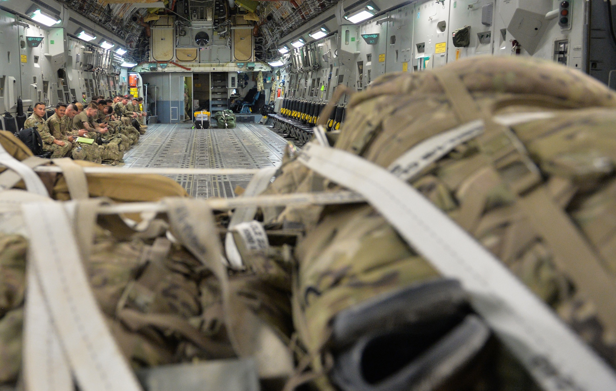U.S. Army Soldiers with the 4th Infantry Division, board a C-17 Globemaster III at Prince Sultan Air Base (PSAB), Kingdom of Saudi Arabia (KSA), October 23, 2109.