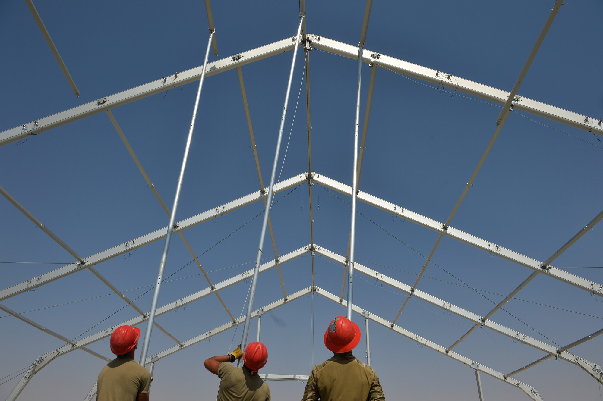 U.S. Air Force Airmen with the 378th Expeditionary Civil Engineering Squadron, build a 6, 500 square foot structural dome October 18, 2019, at Prince Sultan Air Base (PSAB), Kingdom of Saudi Arabia (KSA).
