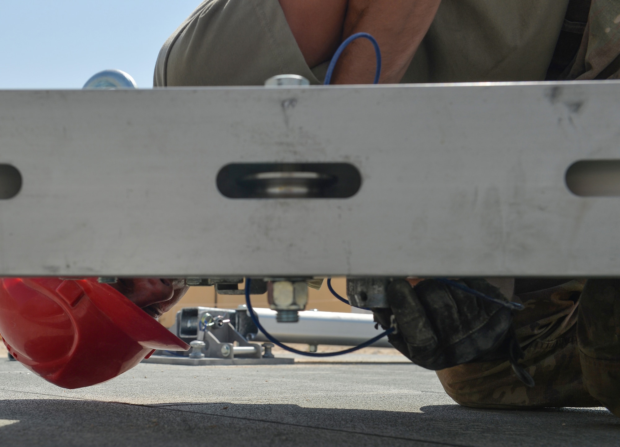 U.S. Air Force Tech. Sgt. Lance Haul, 378th Expeditionary Civil Engineering Squadron, attaches screws onto the arch of a 6,500 square foot structural dome Oct. 18. 2019, at Prince Sultan Air Base (PSAB), Kingdom of Saudi Arabia (KSA).