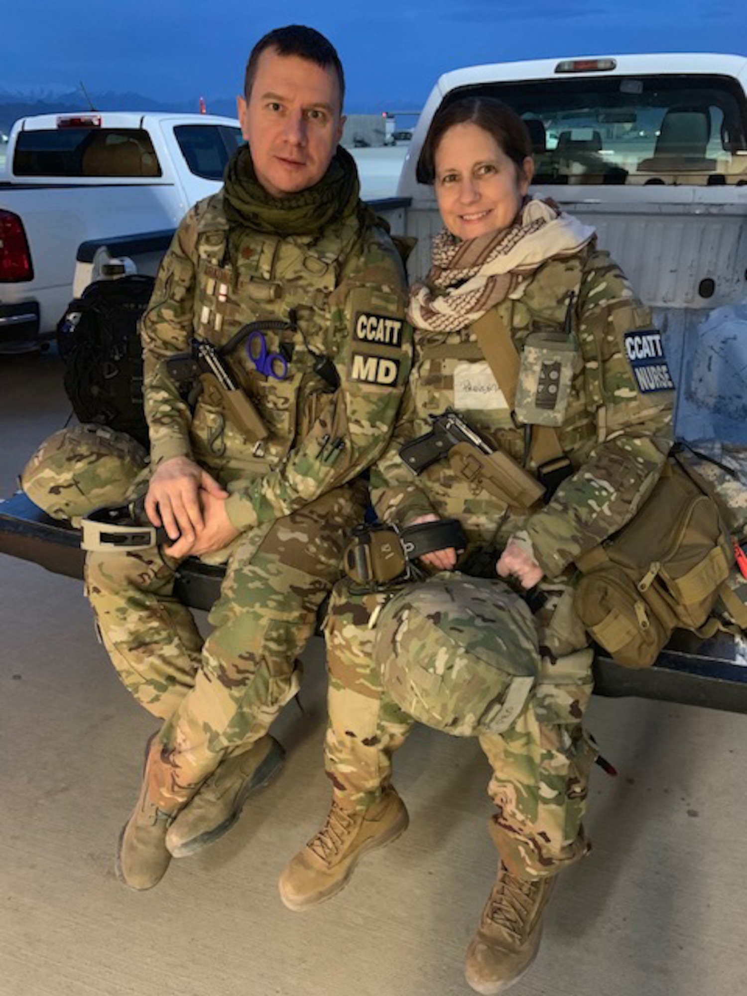 U.S. Air Force Maj. Andrew Kurklinsky, Critical Care Air Transport Team physician and officer in charge, and U.S. Air Force Maj. Tracy Provenzano, a CCATT nurse pose for a photo during their six-month deployment to Bagram Airfield, Afghanistan.