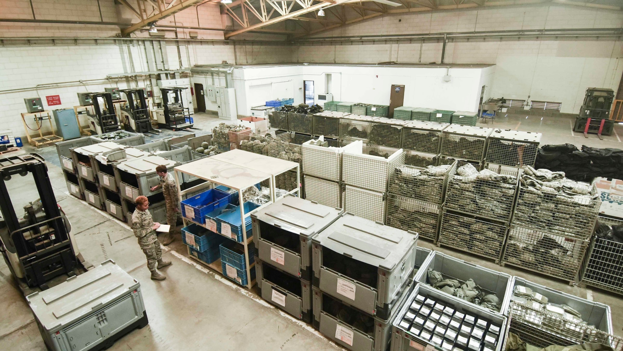 U.S. Air Force Airmen assigned to the 39th Logistics Readiness Squadron conduct an inventory of protective equipment Nov. 18, 2019, at Incirlik Air Base, Turkey. Permanent-party Airmen assigned to Incirlik are required to keep an individual protective equipment bag issued by the 39th LRS for the duration of their assignment. (U.S. Air Force photo by Staff Sgt. Joshua Magbanua)