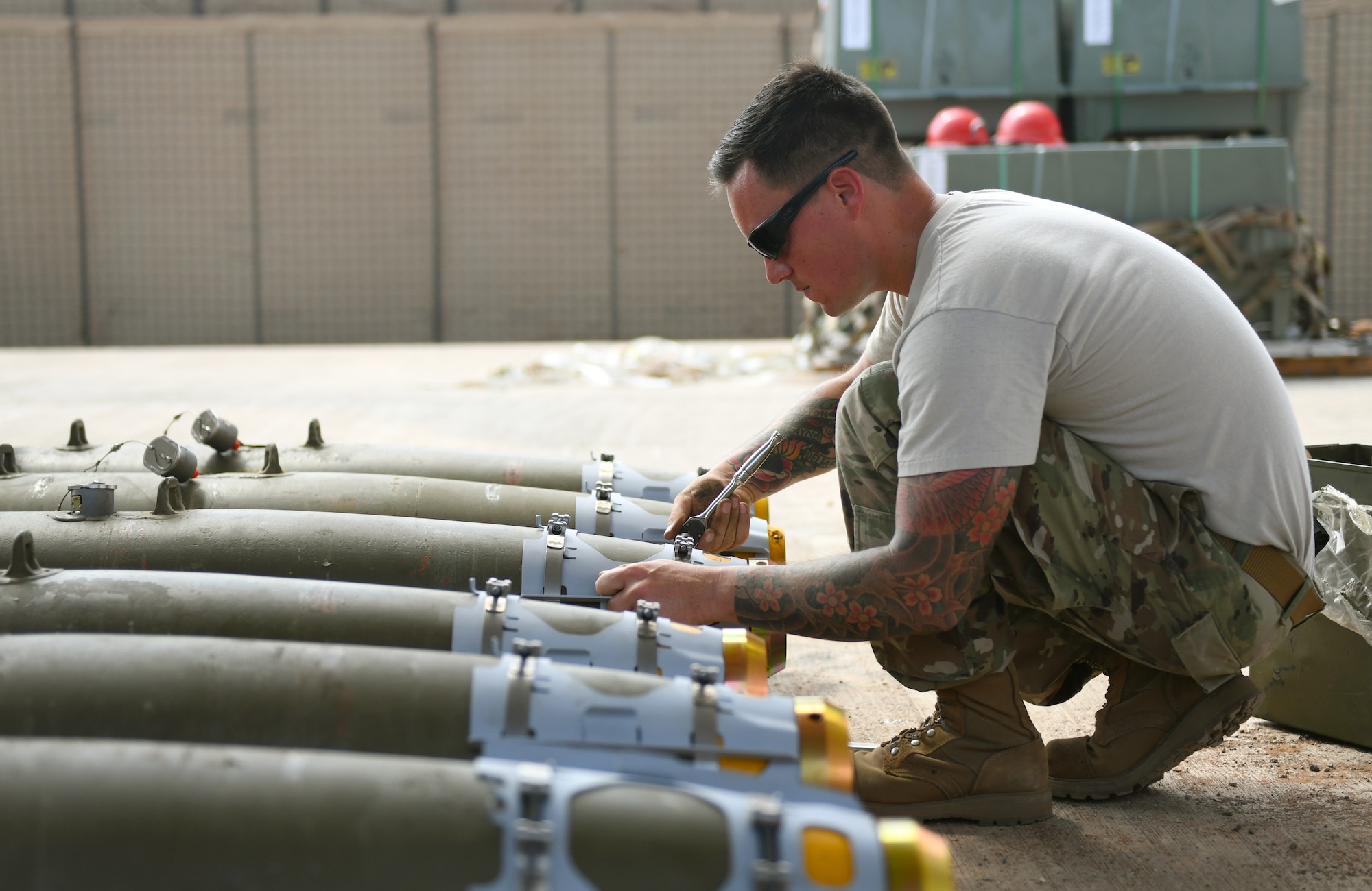 U.S. Air Force Tech. Sgt. Brandon Coleman, 726th Expeditionary Air Base Squadron senior munitions inspector, assembles the nose of munitions during a bomb build at Chabelley Airfield, Djibouti, Nov. 12, 2019. The 726th EABS Munitions Systems Airmen build, inspect and store all munitions at the airfield, ensuring mission effectiveness at a moment’s notice. (U.S. Air Force photo by Staff Sgt. Alex Fox Echols III)