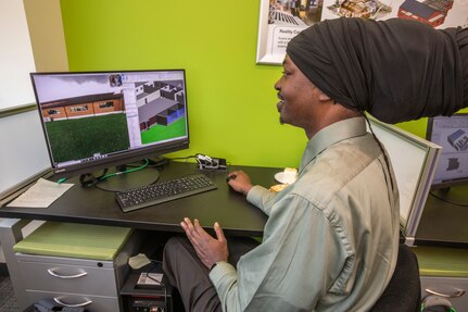 John D. Foster creates a digital image from photos taken by a 3D laser scanner of a New Jersey Army National Guard armory at the Sustainable Facilities Center at the Henry M. Rowan College of Engineering, Rowan University, Glassboro, N.J., Nov. 19, 2019. Rowan University faculty, staff and students at the center are helping the New Jersey Department of Military and Veterans Affairs and the New Jersey Army National Guard efficiently operate facilities.