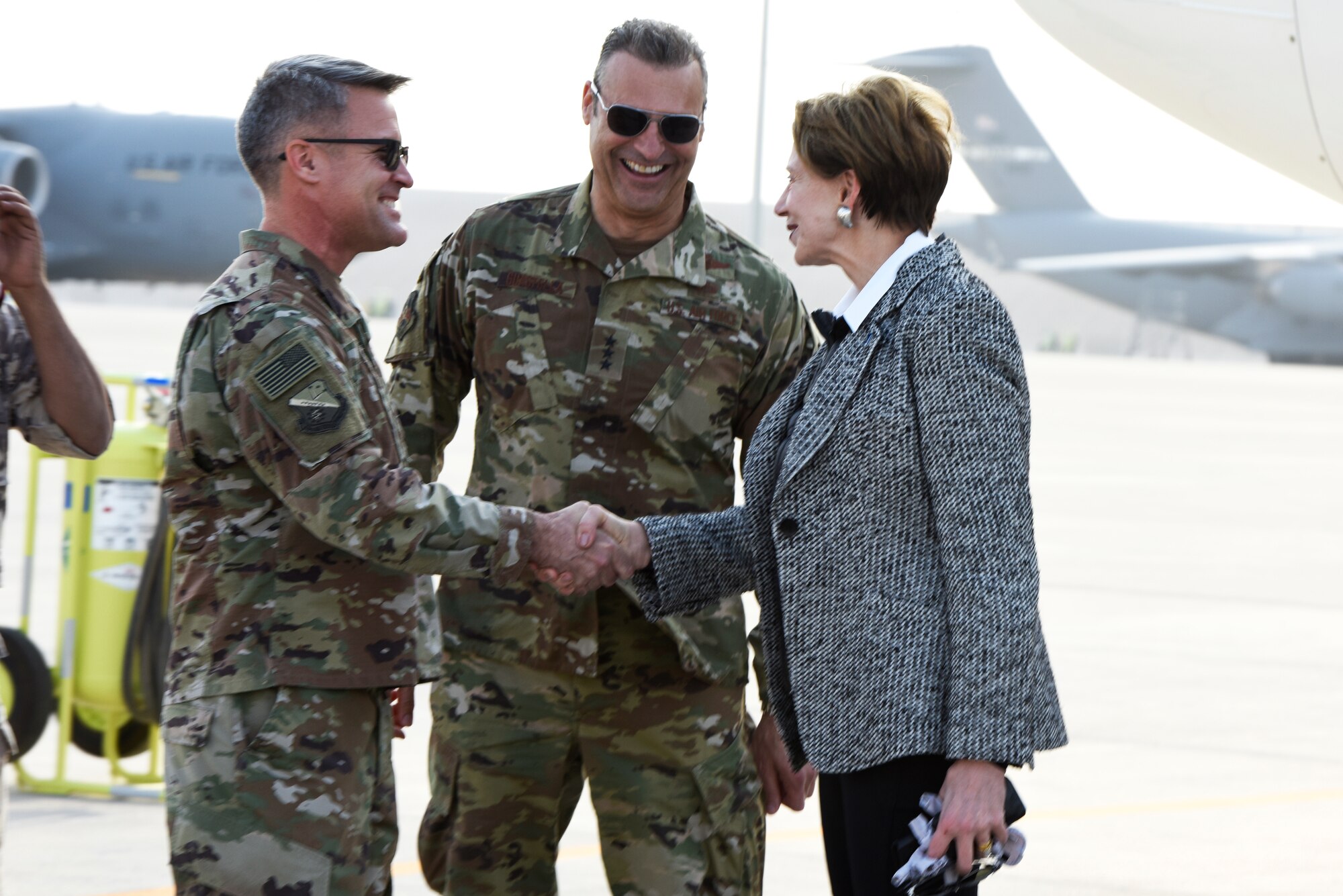 Secretary of the Air Force Barbara Barrett is greeted by Lt. Gen. Joseph Guastella, U.S. Air Forces Central Command commander, and Brig. Gen. Daniel Tulley, 379th Air Expeditionary Wing commander, after arriving at Al Udeid Air Base, Qatar on Nov. 17, 2019. During their first overseas trip, Barrett and Air Force Chief of Staff Gen. David L. Goldfein met with AUAB and Qatari leadership, held an all-call where they spoke to readiness, lethality and the future of the U.S. Air Force and visited Airmen and the facilities where they work and live. (U.S. Air Force photo by Tech. Sgt. Ian Dean)