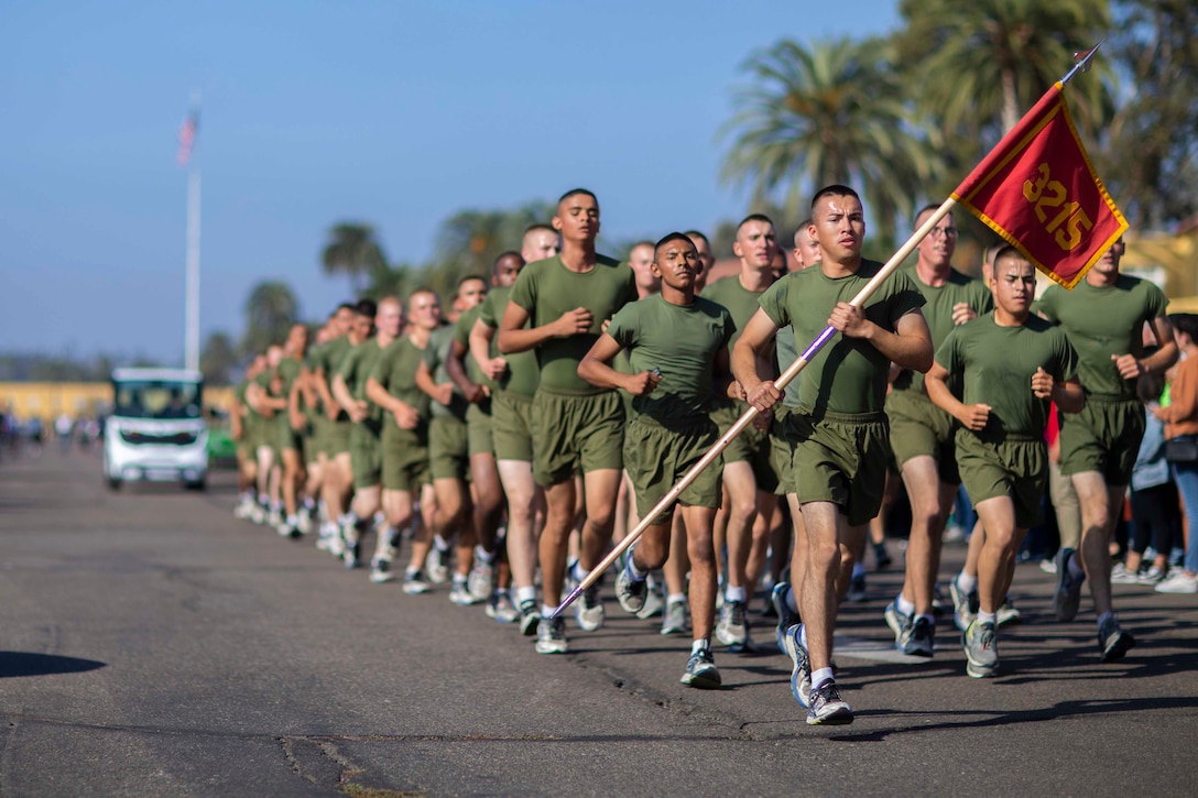 A group of Marines run together.