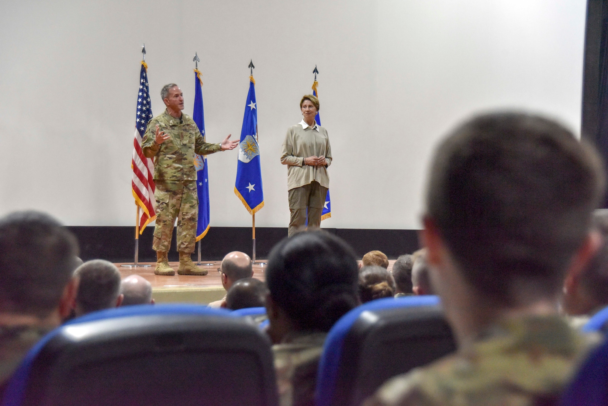 Secretary of the Air Force Barbara Barrett and Air Force Chief of Staff Gen. David L. Goldfein speak to Airmen during an all-call at Al Udeid Air Base, Qatar on Nov. 18, 2019. During the all-call, Barrett and Goldfein spoke to readiness, lethality and the future of the U.S. Air Force. During their visit the Air Force leaders also met with AUAB and Qatari leadership, and visited Airmen and the facilities where they work and live. (U.S. Air Force photo by Tech. Sgt. John Wilkes)