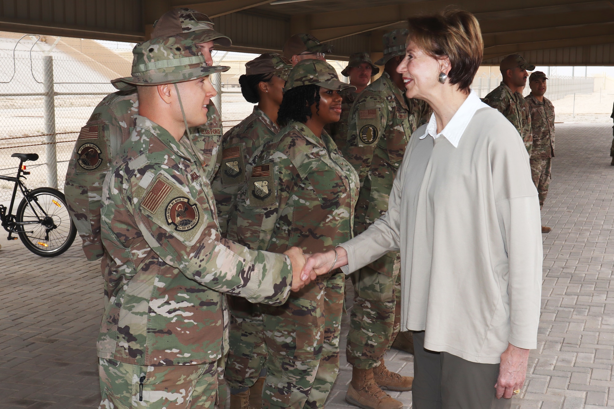 Secretary of the Air Force Barbara Barrett presents the SECAF coin to Staff Sgt. Joshua Maurer, 8th Expeditionary Aircraft Maintenance Squadron, at Al Udeid Air Base, Qatar on Nov. 18, 2019. During their first overseas trip, Barrett and Air Force Chief of Staff Gen. David L. Goldfein met with AUAB and Qatari leadership, held an all-call where they spoke to readiness, lethality and the future of the U.S. Air Force and visited Airmen and the facilities where they work and live.(U.S. Air Force photo by Tech. Sgt. Ian Dean)