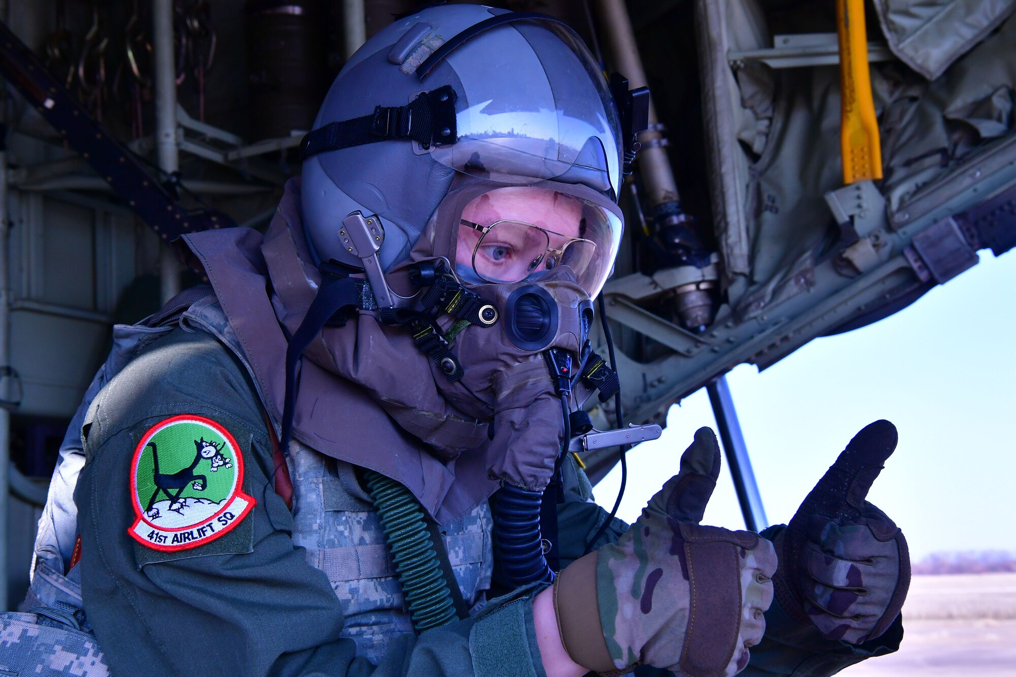 A loadmaster give a thumbs up