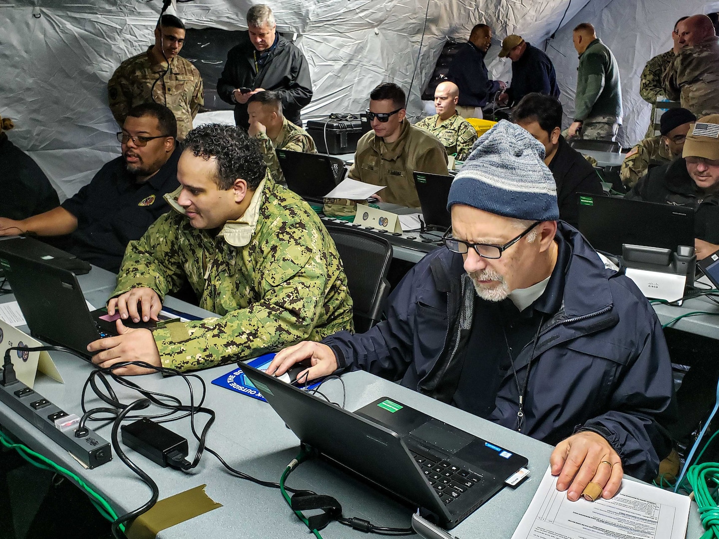 Members of the Joint Task Force Civil Support (JTF-CS) Early-Entry Command Post (EECP) connect and test the command's collaborative tools during a communications exercise (COMMEX) at Joint Base Langley-Eustis. The exercise allowed JTF-CS to test the EECP's ability to quickly deploy in response to a catastrophic event. (Official DoD photo by Mass Communication Specialist 3rd Class Michael Redd/RELEASED)