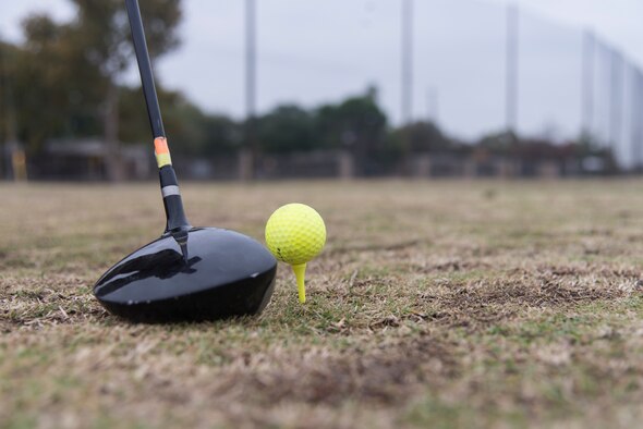 A golf ball is placed on a tee, ready for a drive at Laughlin Air Force Base, Texas, Nov. 21, 2019. The netting in the background, which replaces the trees that were planted in the same location before they were destroyed in a hail storm, aims to provide more opportunities for activities on the range and peace of mind for residents on Vandenberg Drive.
