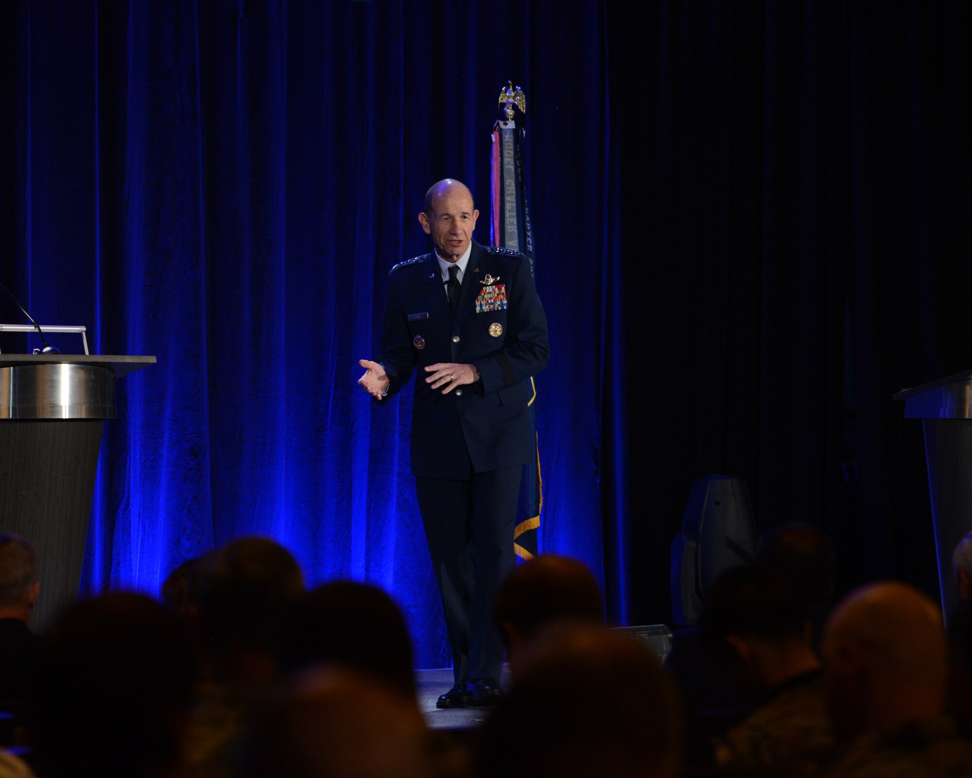 U.S. Air Force Gen. Mike Holmes, commander of Air Combat Command, speaks to Alamo Armed Forces Communication and Engineering Association Chapter Event attendees in San Antonio, Texas, Nov. 20, 2019. During the annual cyber- and technology-focused conference, Holmes discussed the importance of continuously evolving the U.S. military’s multi-domain warfighter to combat tomorrow’s threats. (U.S. Air Force photo by Sharon Singleton)