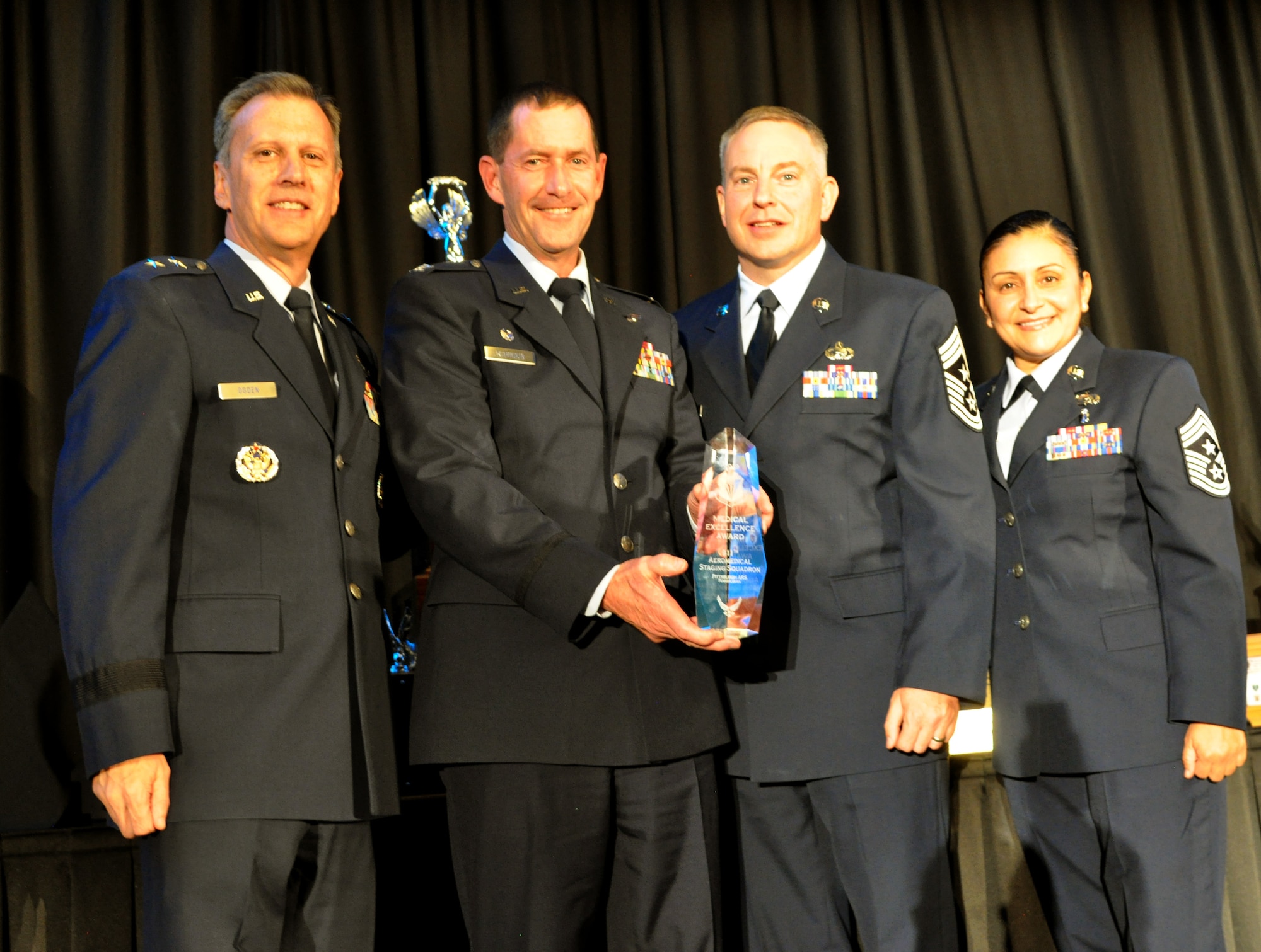 The 911th Airlift Wing's Aeromedical Staging Squadron were the recipients of 4th Air Force's Medical Excellence Award for 2019. The trophy was present during the  20th Annual Raincross Awards dinner Nov. 19, 2019 at the Riverside Convention Center, Riverside, California. (U.S. Air Force photo by Candy Knight)