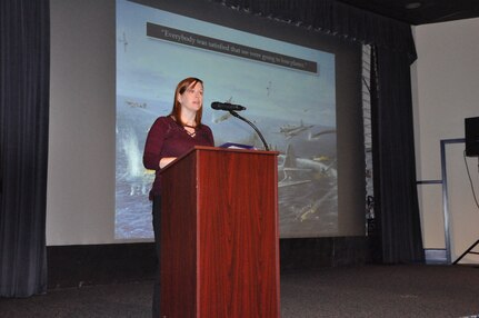 IMAGE: DAHLGREN, Va. (Nov. 15, 2019) - Laura Orr, director of education at Hampton Roads Naval Museum in Norfolk, Va., and co-author of “Never Call Me A Hero:  A Legendary American Dive-Bomber Pilot Remembers the Battle of Midway” highlights the stories of Midway warfighters as a part of the Naval Heritage Command Lecture Series sponsored by the Naval Surface Warfare Center Dahlgren Division Integrated Combat Systems Department Nov. 15 at the base theater.