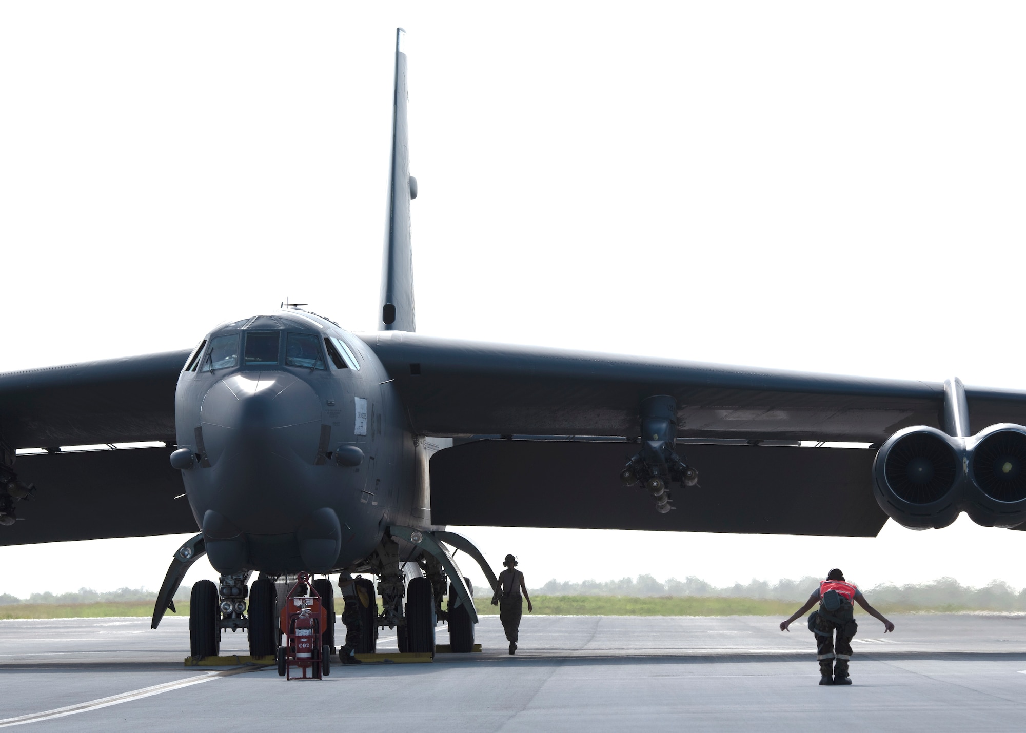 A B-52 Stratofortress with the 69th Expeditionary Bomb Squadron sits on the flightline at Andersen Air Force Base, Guam, Nov. 19, 2019. B-52s have held a vital role in supporting the Continuous Bomber Presence mission in the Indo-Pacific region since 2004.  (U.S. Air force photo by Staff Sgt. Kevin Iinuma)