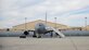 A KC-46 Pegasus is parked at a ramp at Edwards Air Force Base, California, with a Wing Aerial Refueling Pod (WARP) on each wing. The KC-46 Pegasus recently finished WARPs testing with an AV-8B and F-18D/G. The WARPs system allows the Pegasus to simultaneously refuel two aircraft via drogue chutes. (U.S. Air Force photo by Giancarlo Casem)