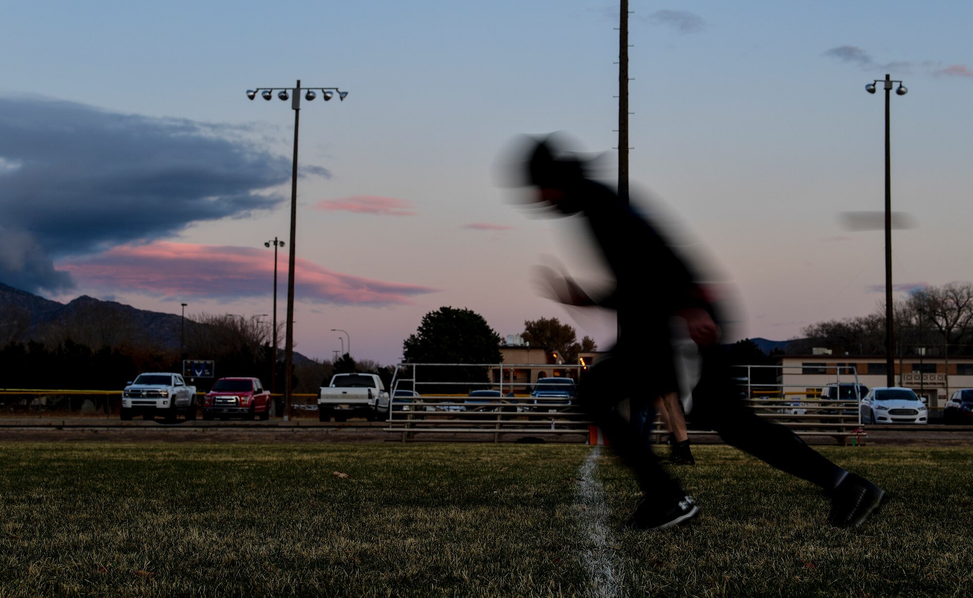 A photo of a football player running