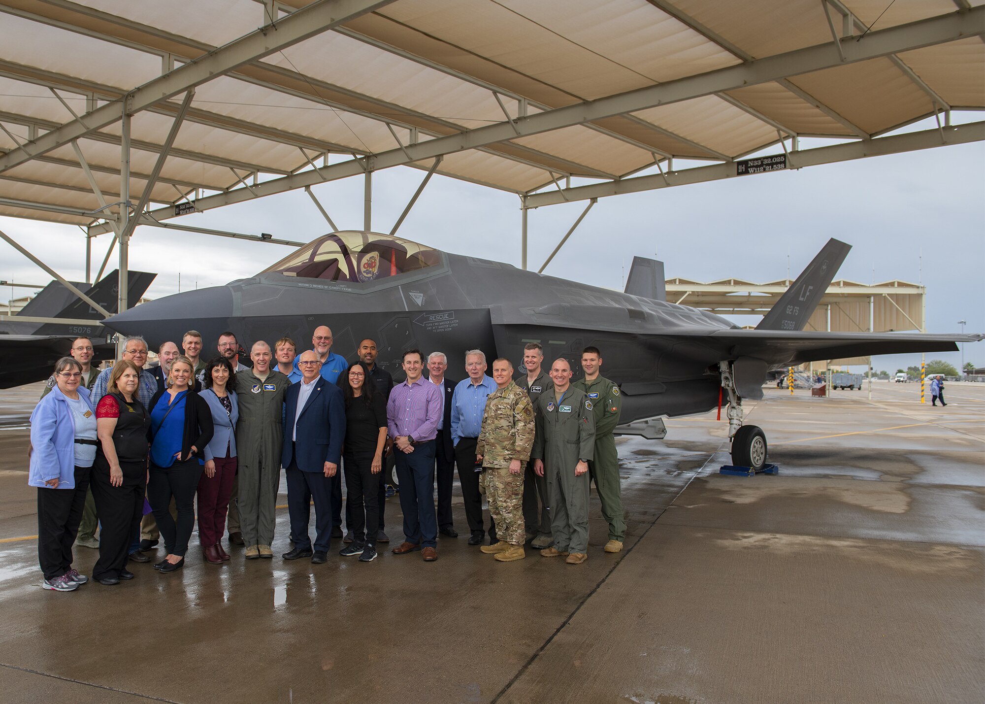 Eielson Air Force Base military and civic leaders pose by an F-35A Lightning II, Nov. 19, 2019, at Luke AFB, Ariz.