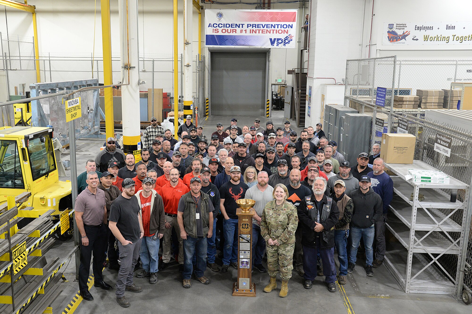 Members of the 309th Maintenance Support Squadron and Brig. Gen. Constance Jenkins, mobilization assistant to the commander for the Ogden Air Logistics Complex, during the presentation of the L-A-M-P award Oct. 16, 2019, at Hill Air Force Base, Utah. The squadron was recognized for its dedication to safety and advancing Voluntary Protection Program standards. (U.S. Air Force photo by Alex R. Lloyd)