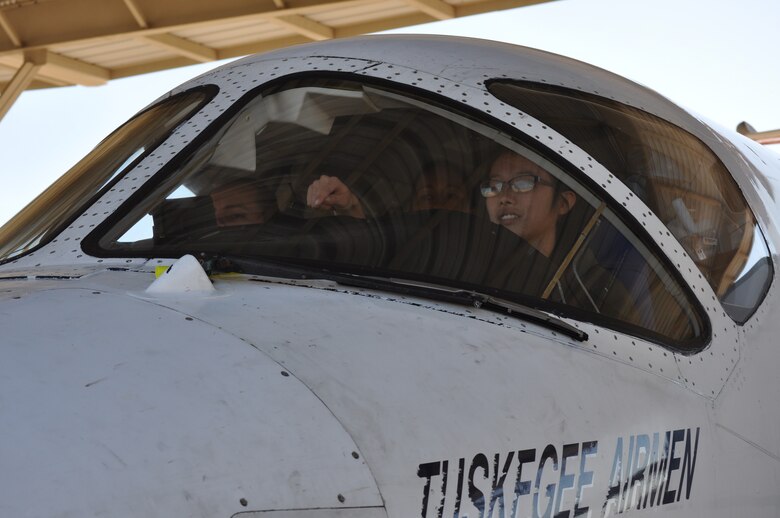 Members from 19th Air Force, surgeon general's office and 99th Flying Training Squadron instructor pilot conduct a cockpit assessment on a pilot candidate from a Reserve Officers' Training Corps detachment who does not meet minimum height standards to be an Air Force pilot.  Once a candidate is selected for a pilot slot, they will have their Initial Flying Class I physical exam, which automatically places a candidate into the waiver process, if they do not meet height standards.