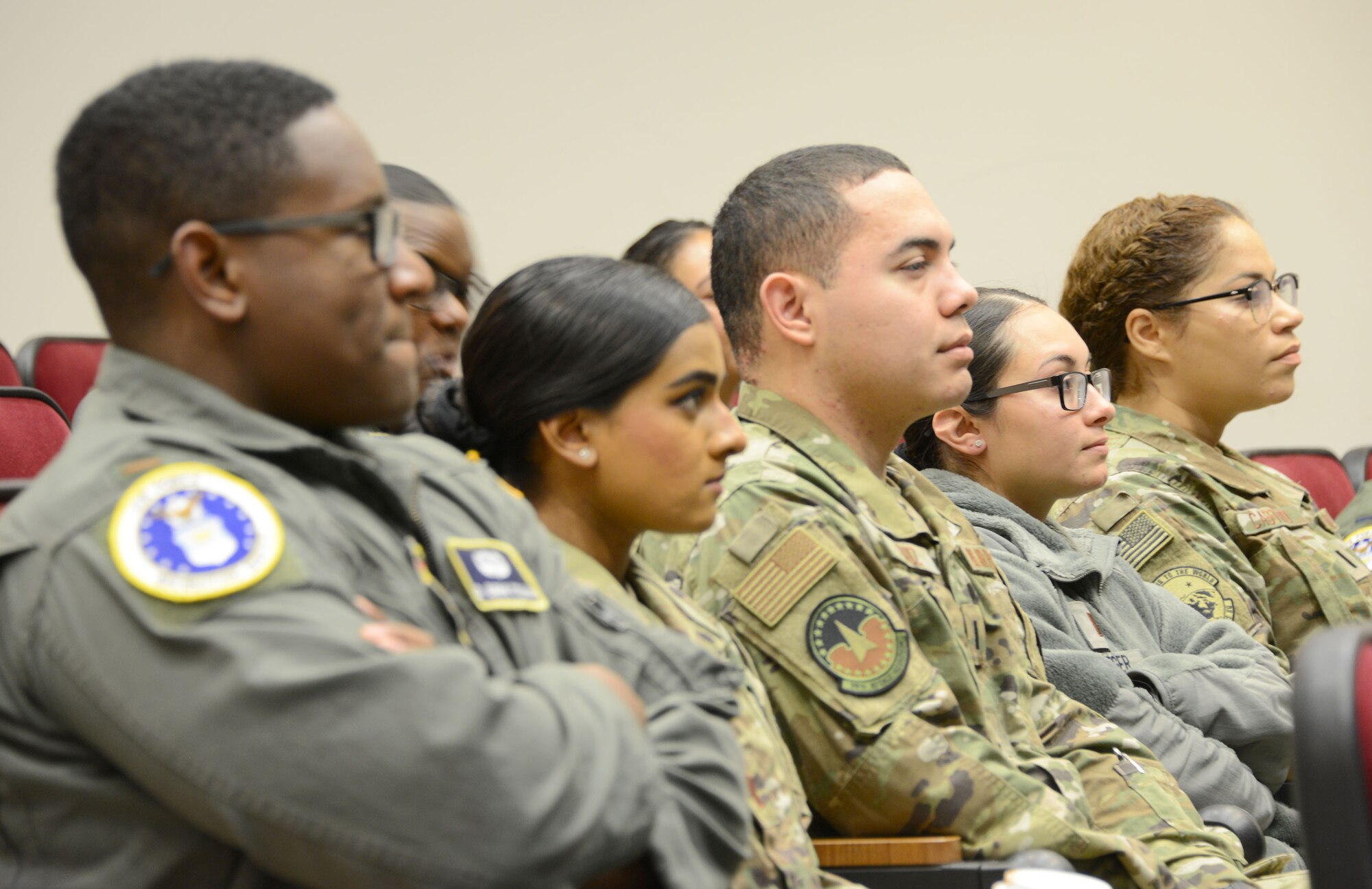 A group of Air Force mentors attend a mentoring lesson given by Air Force Recruiting Service's Detachment 1 during an Aim High outreach event at Maxwell Air Force Base, Alabama.