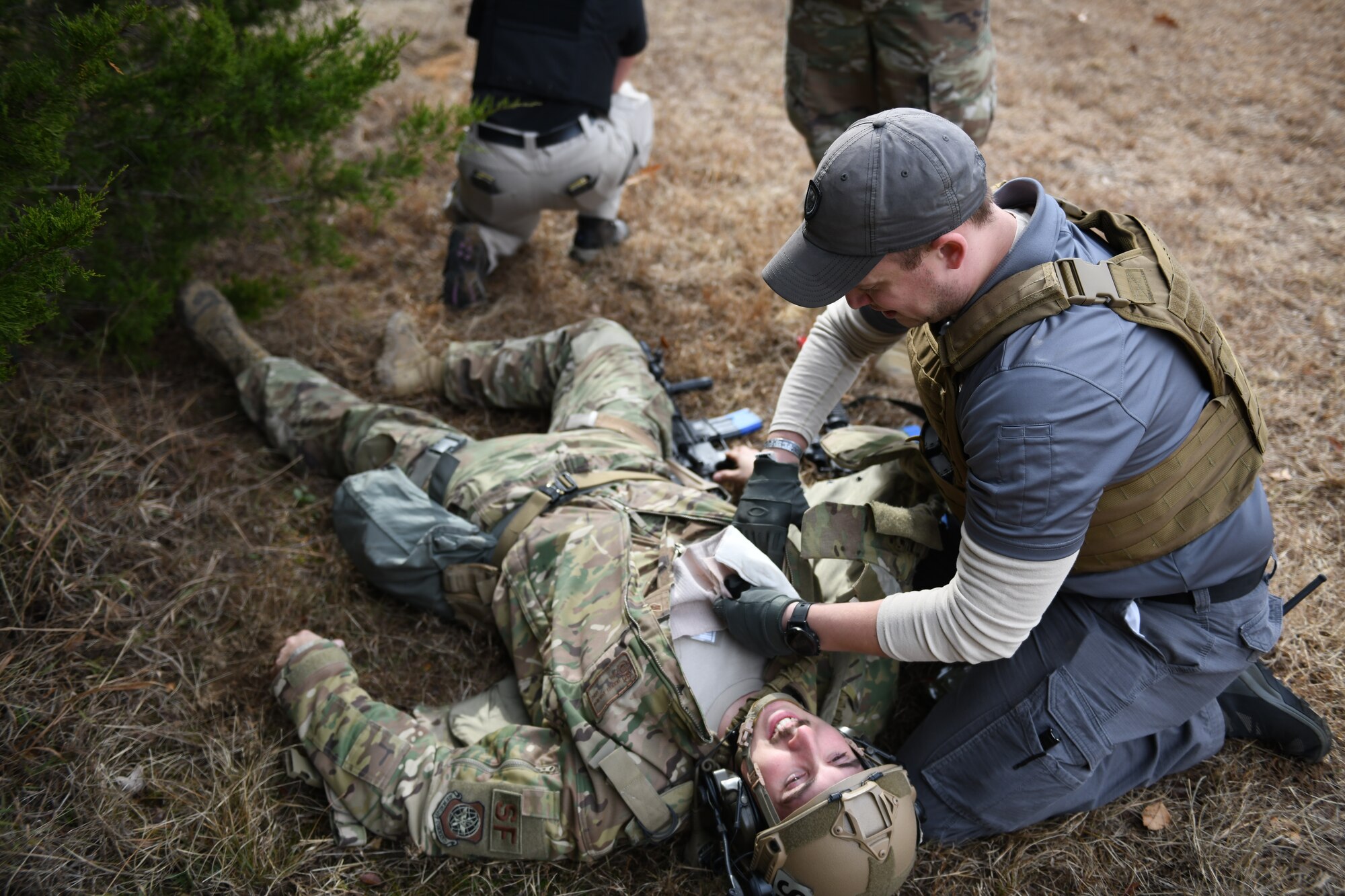 an airman performs simulated medical treatment