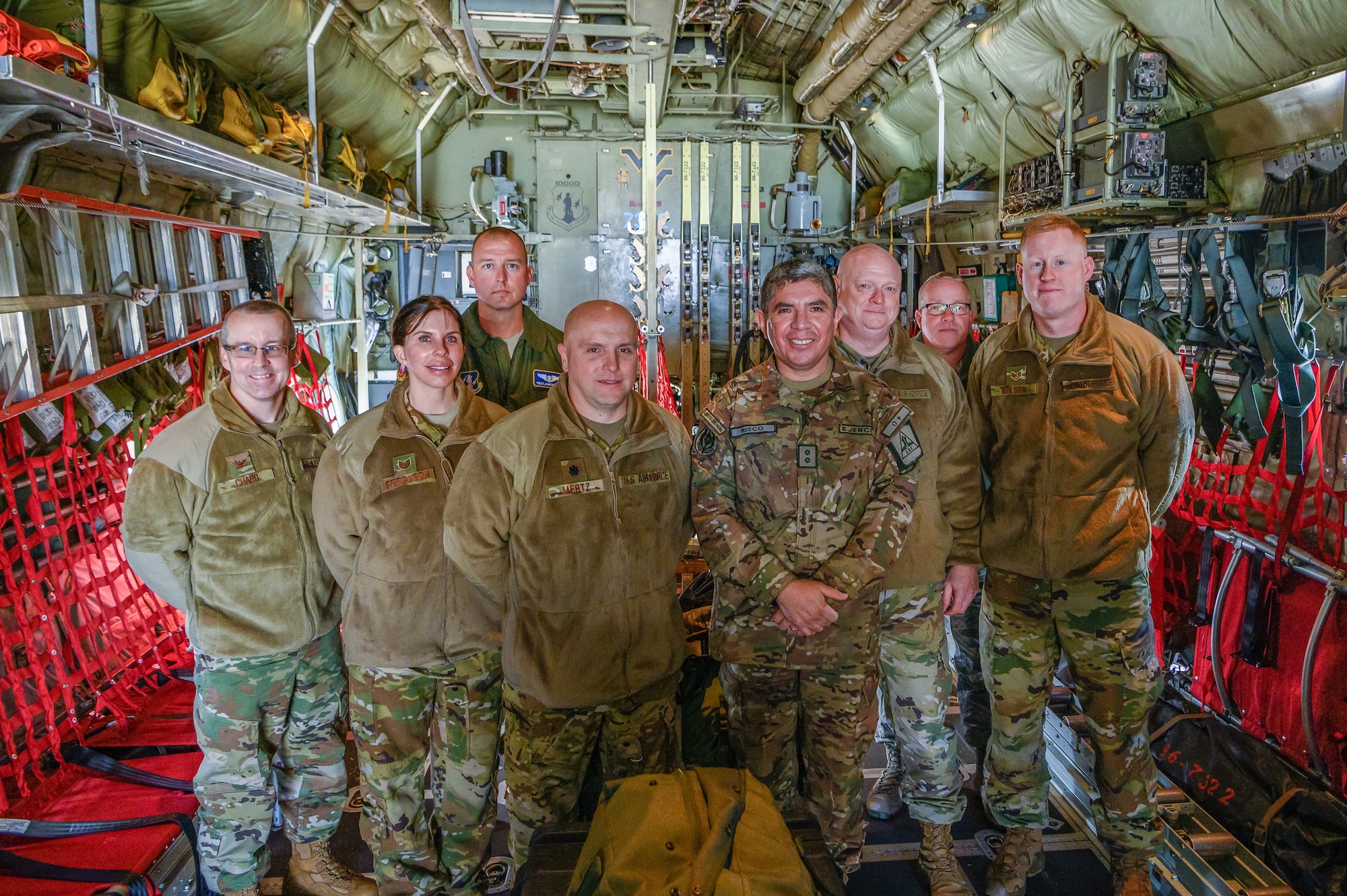 Members of the 167th Aeromedical Evacuation Squadron pose for a photo with Maj. Gen. Mario E. Risco, Defense and Military Attaché to the Embassy of Peru in Washington, D.C., during a State Partnership Program (SPP) visit.