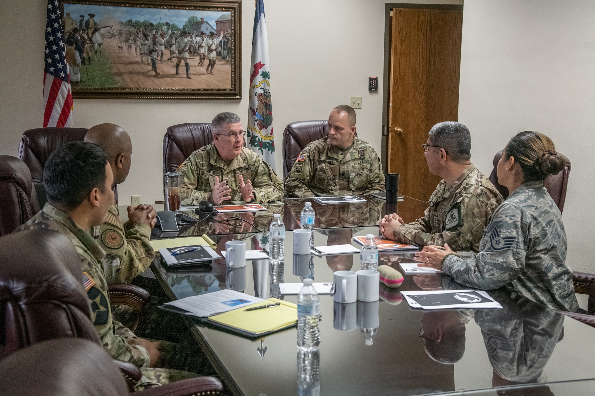 Maj. Gen. James Hoyer, Adjutant General of the West Virginia National Guard, speaks with Maj. Gen. Mario E. Risco, Defense and Military Attaché to the Embassy of Peru in Washington, D.C., during a State Partnership Program (SPP) visit.