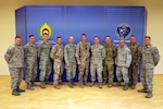 Members of the Michigan Air National Guard and the Latvian Air Force pose Nov. 15, 2019, after a planning meeting at Lielvārde Air Base, Latvia, to chart cooperation under the National Guard Bureau's State Partnership Program.