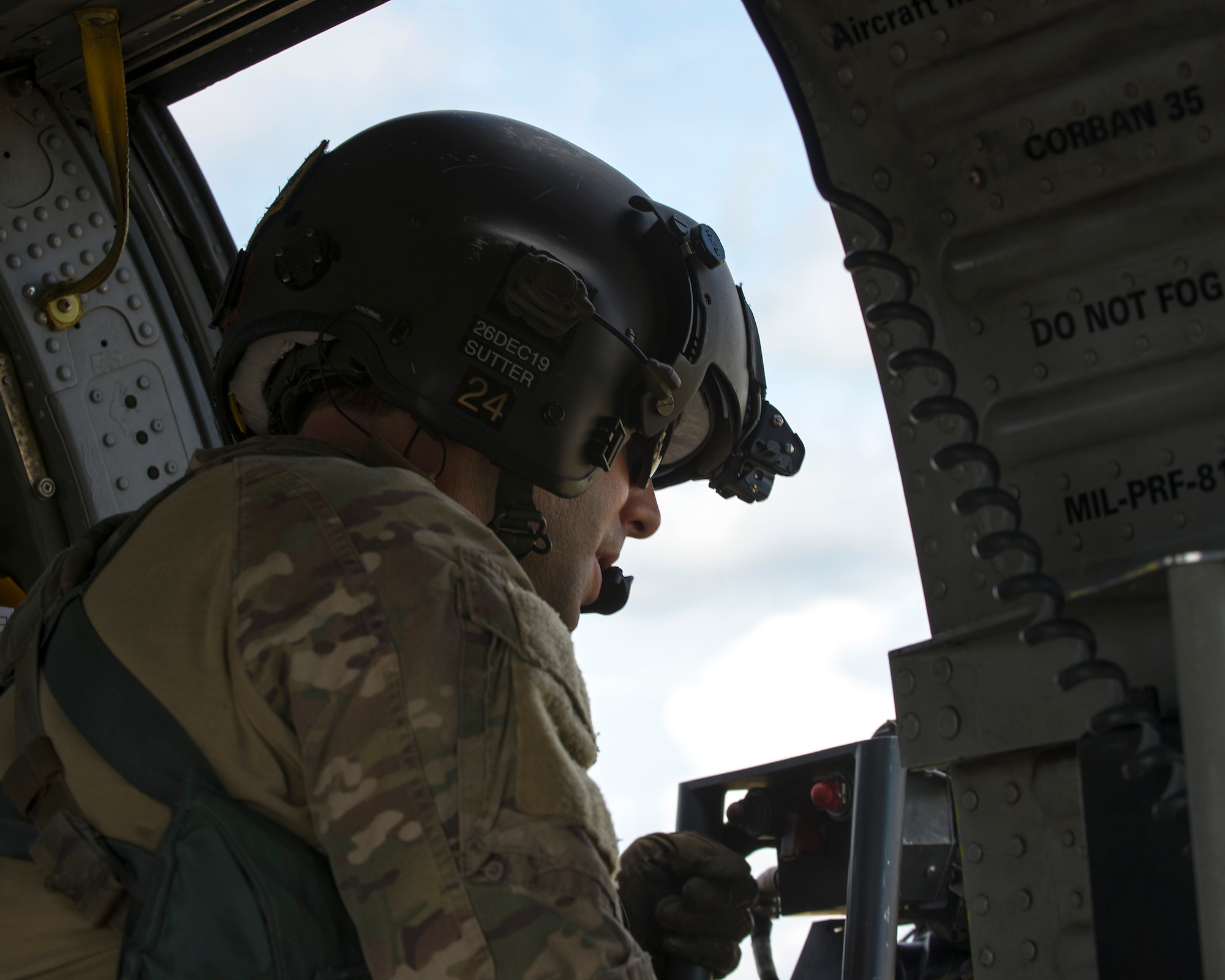 U.S. Air Force Reserve Master Sgt. Jeremy Sutter, a special missions aviator assigned to the 305th Rescue Squadron (RQS), Davis-Monthan Air Force Base, Ariz., operates an HH-60 Pave Hawk helicopter’s .50-caliber weapon over Avon Park Air Force Range, Fla., Nov. 8, 2019.
