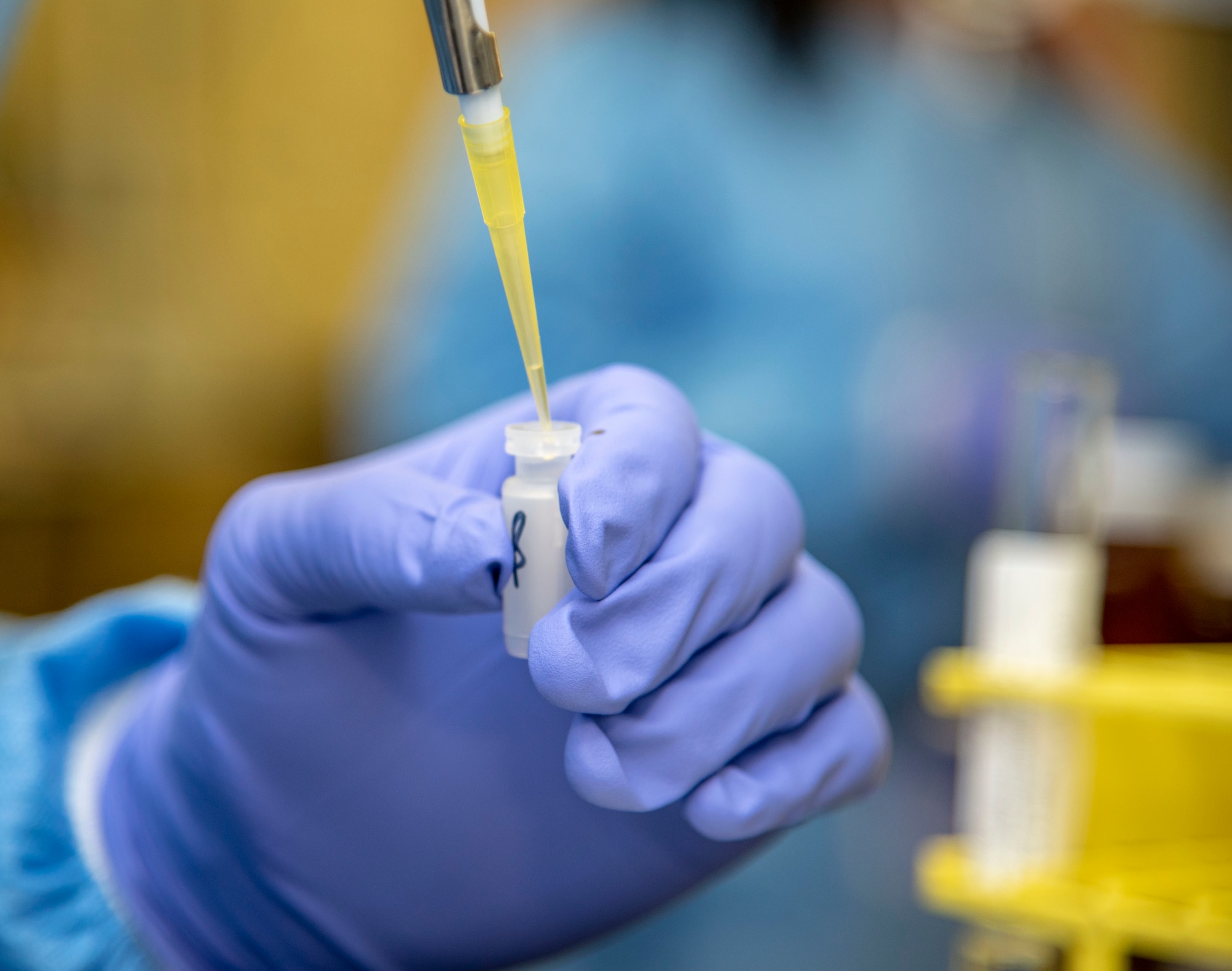 David Barajas, Armed Forces Medical Examiner System Forensic Toxicology analytical toxicologist 2, prepares a vial for testing October 31, 2019 at the AFMES Forensic Toxicology lab. The lab confirms fentanyl and its metabolite, norfentanyl, as well as synthetic cannabinoids, commonly called Spice and K2, for the DDRP labs. (U.S. Air Force photo by Staff Sgt. Nicole Leidholm)