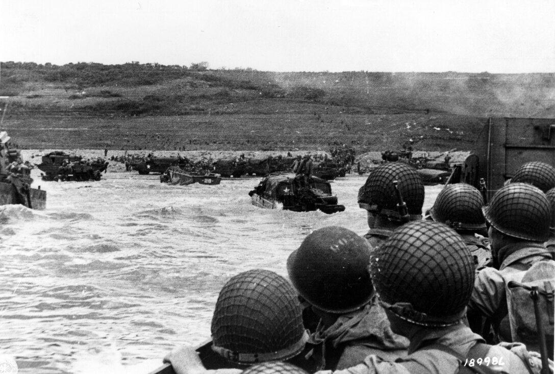 Troops watch activity on Omaha Beach as their LCVP landing craft approaches shore on D-Day, June 6, 1944 (U.S. Army Signal Corps/U.S. National Archives)