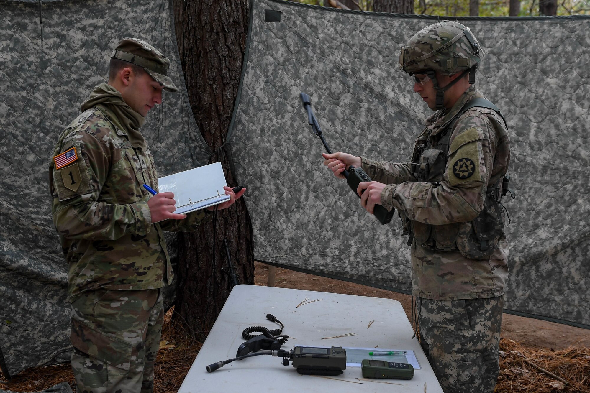 U.S. Army Capt. David Morin, a network officer with the 93rd Signal Brigade, begins the task to transmit a spot report during the Expert Soldier Badge course at Joint Base Langley-Eustis, Virginia, Nov. 18, 2019. The ESB allows a Soldier to demonstrate a high level of competence and ability to perform to-standard Skill Level I Warrior Tasks and brigade commander-selected tasks. (U.S. Air Force photo by Senior Airman Derek Seifert)