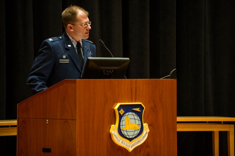 Col. Parker Wright, National Air and Space Intelligence Center commander, speaks during the chief scientist induction ceremony on Oct. 25, 2019. Wright hosted the event, inducting Duane Harrison as the eighth chief scientist in the center’s history. (U.S. Air Force photo by Senior Airman Devin M. Rumbaugh)