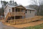 Photo depicting Theresa Chandler's new home, which was officially given to her Nov. 22, 2019, through the RISE West Virginia program. West Virginia Voluntary Organizations Active in Disasters (WV VOAD) built the home for Ms. Chandler through the RISE West Virginia program and this occasion marked the first completed reconstruction for VOAD. (West Virginia National Guard photo by Bo Wriston)