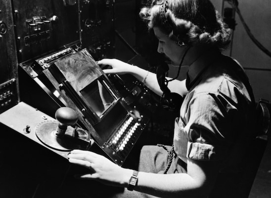 Women’s Auxiliary Air Force radar operator Denise Miley plotting aircraft on cathode ray tube of RF7 receiver in Receiver Room at Bawdsey Chain Home radar station (Courtesy Royal Air Force, Imperial War Museum, Goodchild)