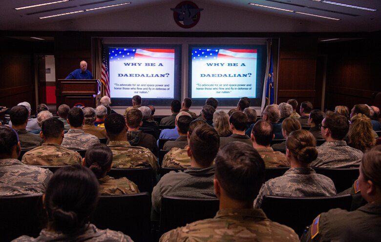 Retired U.S. Army Col. Bruce Crandall, a Medal of Honor recipient, talks about his time in the service during a professional development presentation at Joint Base Lewis-Mcchord, Wash., Nov. 21, 2019. By the end of the Vietnam War, Crandall had flown more than 900 combat missions. (U.S. Air Force photo by Senior Airman Tryphena Mayhugh)