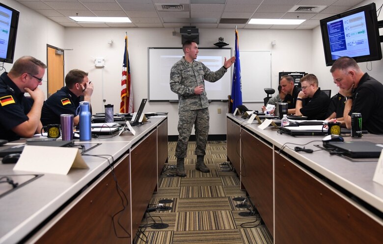 Staff Sgt. Tyler Ritchey, 22nd Civil Engineering Squadron fire protection craftsman, instructs during the KC-46 Firefighter Symposium Nov. 12, 2019 at McConnell Air Force Base, Kan. The symposium which, focused on the familiarization of the KC-46 to provide effective emergency response actions, was the first ever Air Force-wide KC-46 fire protection training. (U.S. Air Force photo by Airman 1st Class Nilsa E. Garcia)