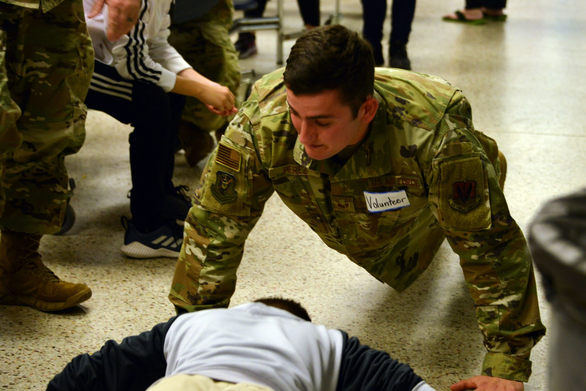 Staff Sgt. Zachary Perez, 101st Air and Space Operations Group intelligence analyst at Tyndall Air Force Base, Florida, attended a Thanksgiving holiday lunch at Northside Elementary School in Panama City, Florida, Nov. 21, 2019. Team Tyndall members helped serve food and also engaged with children whose families were not able to attend the event. Team Tyndall members donate hundreds of hours of volunteer work each year to help support the local community. (U.S. Air Force photo by 2nd Lt. Kayla Fitzgerald)