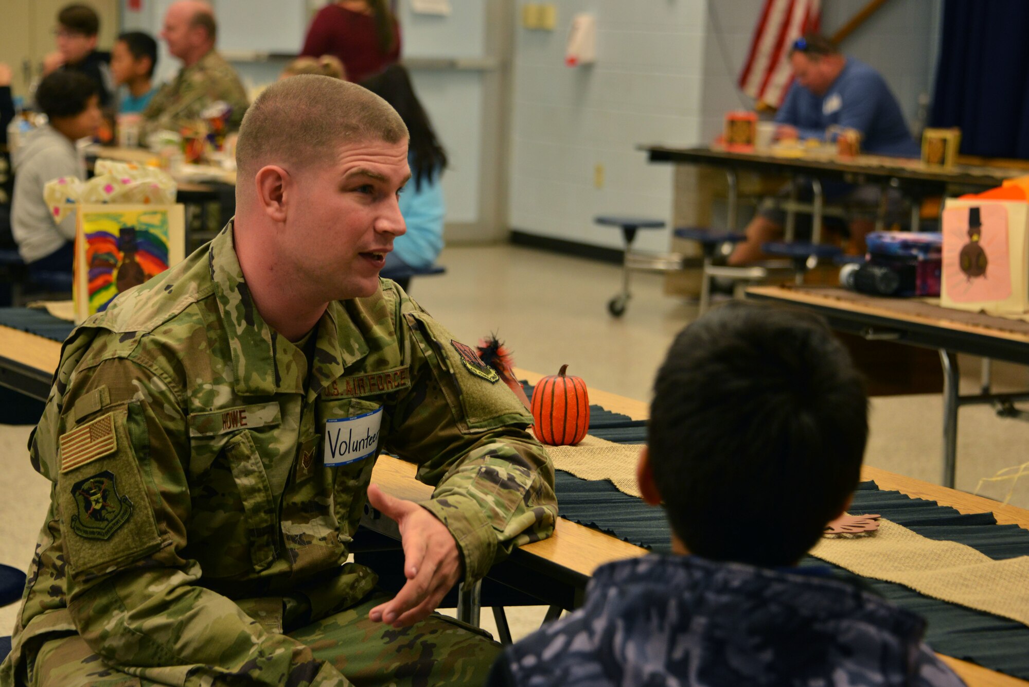 Airmen stationed at Tyndall Air Force Base, Florida, attended a Thanksgiving holiday lunch at Northside Elementary School in Panama City, Florida, Nov. 21, 2019. Team Tyndall members helped serve food and also engaged with children whose families were not able to attend the event. Team Tyndall members donate hundreds of hours of volunteer work each year to help support the local community. (U.S. Air Force photo by 2nd Lt. Kayla Fitzgerald)