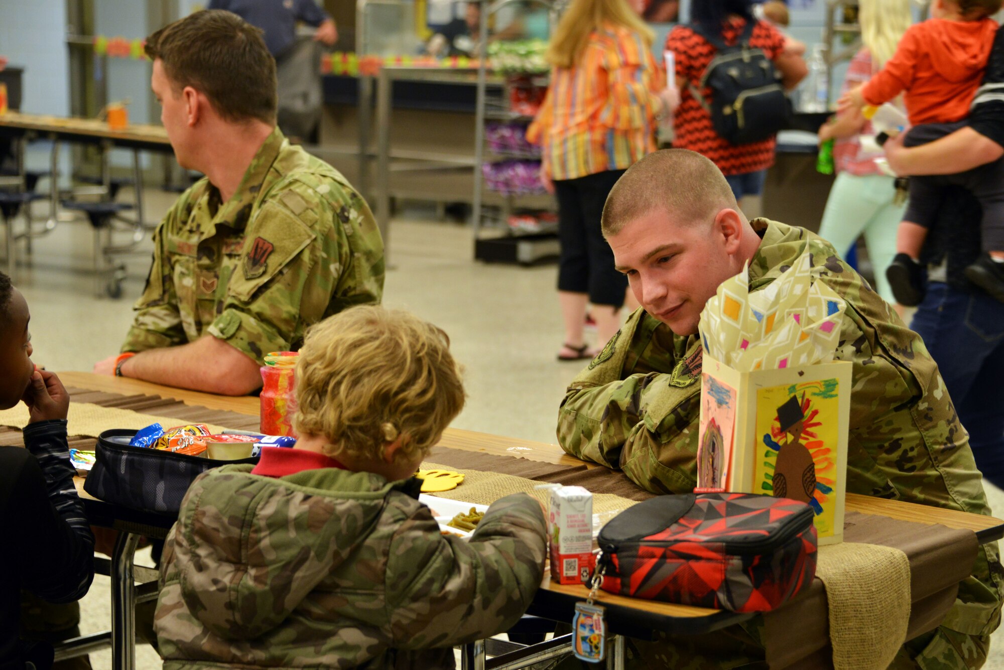 Airmen stationed at Tyndall Air Force Base, Florida, attended a Thanksgiving holiday lunch at Northside Elementary School in Panama City, Florida, Nov. 21, 2019. Team Tyndall members helped serve food and also engaged with children whose families were not able to attend the event. Team Tyndall members donate hundreds of hours of volunteer work each year to help support the local community. (U.S. Air Force photo by 2nd Lt. Kayla Fitzgerald)
